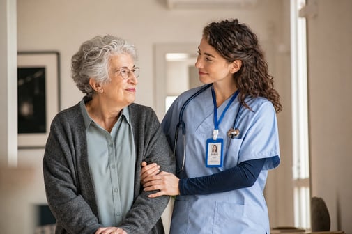 Antonia, 80 years old, with one of her nurses in the Residence.
